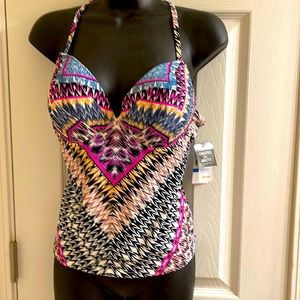 Made exclusively for Macy’s by Raisins. Tankini top with built-in bra/padding.